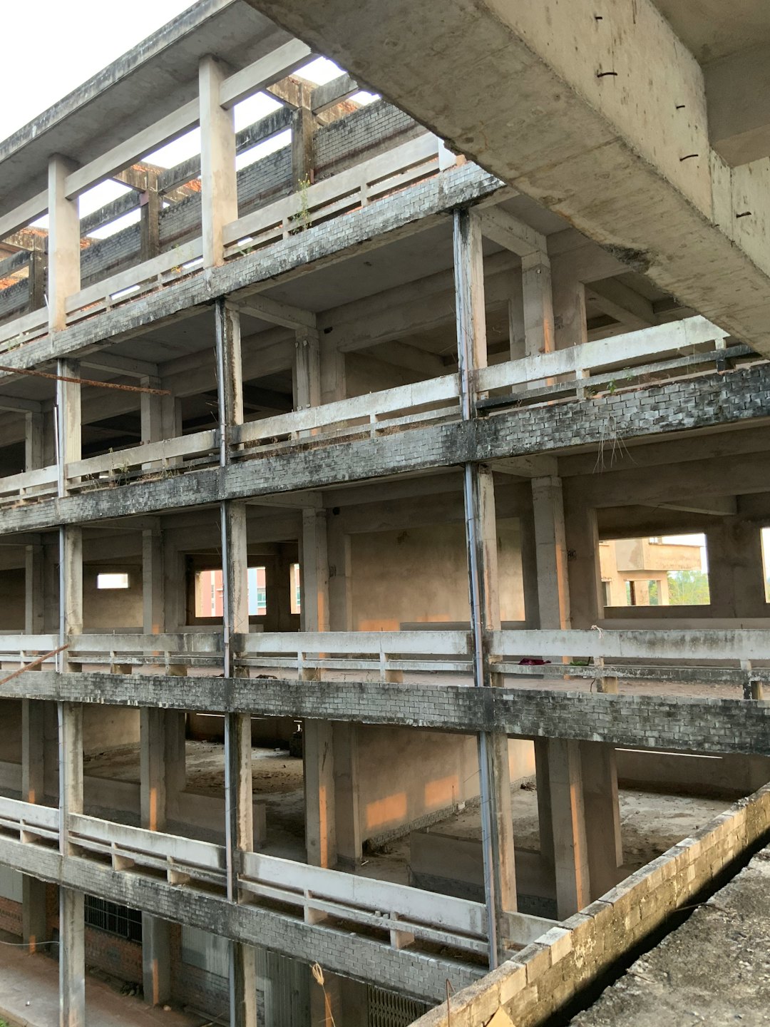 Skeletal concrete structure of a building under construction.
